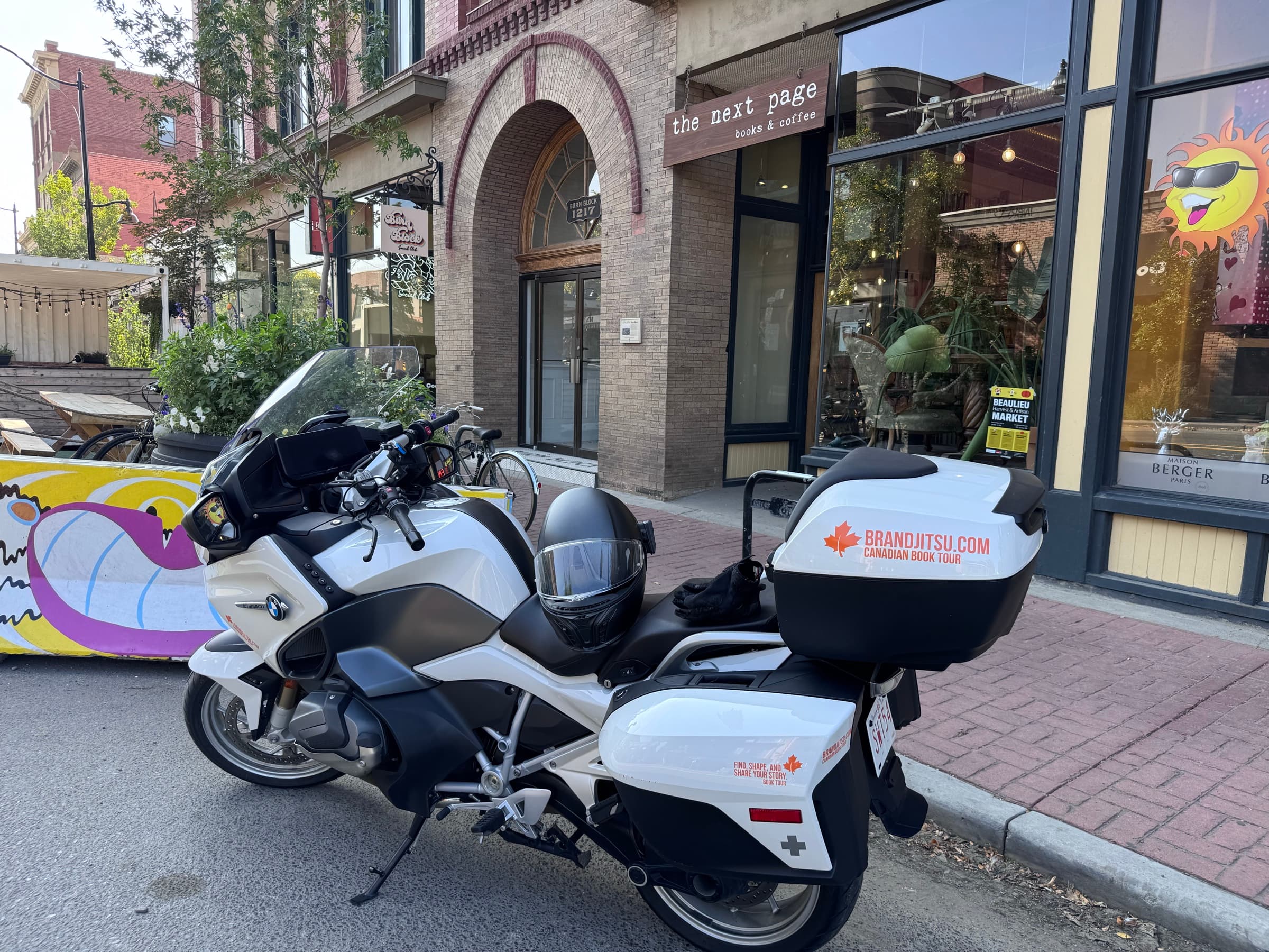 BrandJitsu™ Canadian Book Tour motorcycle parked outside the Next Page Books & Coffee